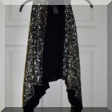 H49. Peachoo Krejberg black sequin vest. - $85